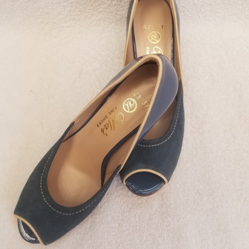 New and unworn all leather heels.